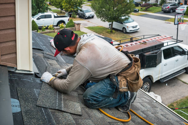 Professional Roof Replacement technician working in Monroe, IN